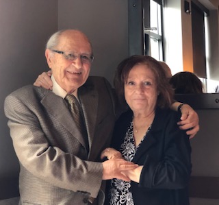 Dr. Naim Atiyeh with his arms around his wife, Miss Wafa Mroueh, now